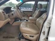 ✅ 2000 Jeep Grand Cherokee Limited • VIN: 1J4GW58N5YC174371 • Lot: 60941615. Listed on Copart with 179,399 mi. Free auction sales archive from the USA and detailed vehicle history report at DreamBid. Image 7.