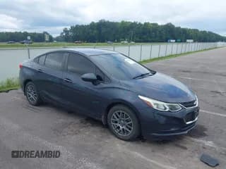 ✅ 2016 Chevrolet Cruze LS • VIN: 1G1BC5SM6G7296939 • Lot: 40132223. Listed on IAAI with 103,565 mi. Free auction sales archive from the USA and detailed vehicle history report at DreamBid. Image 1.