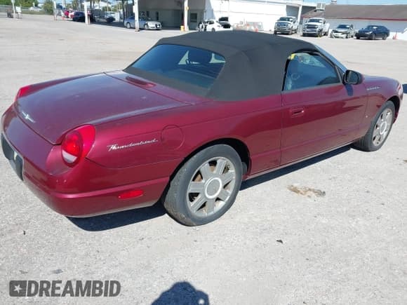 ✅ 2004 Ford Thunderbird Deluxe • VIN: 1FAHP60A14Y108487 • Lot: 41690157. Listed on IAAI with 13,272 mi. Free auction sales archive from the USA and detailed vehicle history report at DreamBid. Image 4.