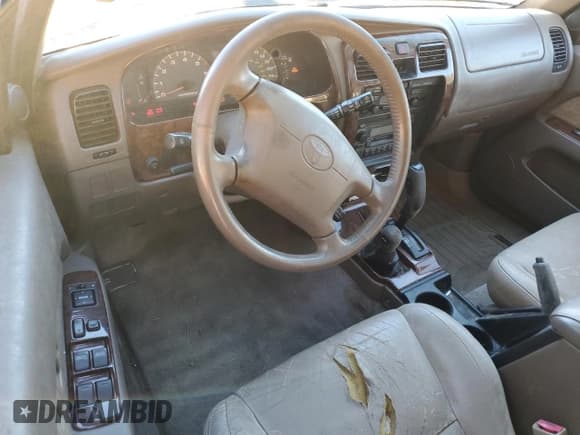 ✅ 1999 Toyota 4Runner Limited • VIN: JT3HN87R5X9024909 • Lot: 87409825. Listed on Copart with 256,706 mi. Free auction sales archive from the USA and detailed vehicle history report at DreamBid. Image 8.