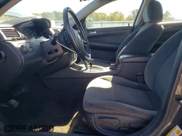 ✅ 2014 Chevrolet Impala LS • VIN: 2G1WA5E38E1144729 • Lot: 90145975. Listed on Copart with 111,577 mi. Free auction sales archive from the USA and detailed vehicle history report at DreamBid. Image 7.