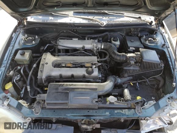 ✅ 1999 Kia Spectra • VIN: KNAFB1210X5802560 • Лот: 89925125. Опубликован ранее на Copart с пробегом 112 151 миль. Бесплатный доступ к архиву аукционных продаж из США и подробный отчёт об истории автомобиля на DreamBid. Изображение 11.