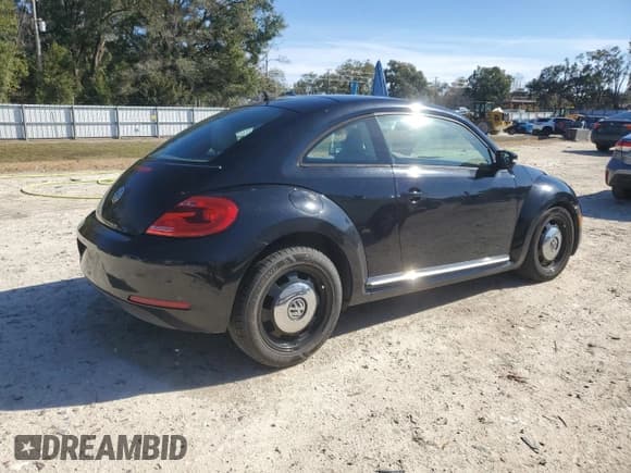 ✅ 2013 Volkswagen Beetle Fender Edition • VIN: 3VWJP7AT9DM686699 • Lot: 89312445. Listed on Copart with 105,748 mi. Free auction sales archive from the USA and detailed vehicle history report at DreamBid. Image 3.