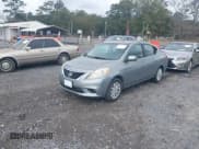 ✅ 2013 Nissan Versa S • VIN: 3N1CN7AP1DL860438 • Lot: 43799793. Listed on IAAI with 114,569 mi. Free auction sales archive from the USA and detailed vehicle history report at DreamBid. Image 2.
