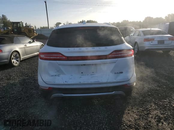 ✅ 2016 Lincoln MKC Reserve • VIN: 5LMTJ3DH8GUJ19051 • Lot: 85591045. Listed on Copart with 89,358 mi. Free auction sales archive from the USA and detailed vehicle history report at DreamBid. Image 6.