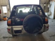 ✅ 2000 Toyota RAV4 • VIN: JT3HP10V4Y0232794 • Lot: 84278185. Listed on Copart with 243,884 mi. Free auction sales archive from the USA and detailed vehicle history report at DreamBid. Image 6.