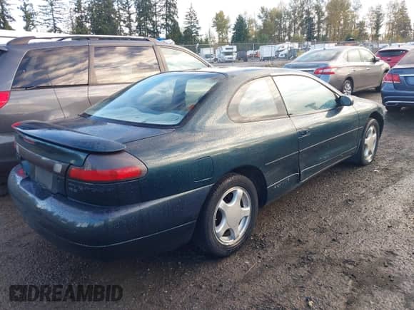 1995 Dodge Avenger z VIN 4B3AU52N9SE215767, wystawiony jako IAAI lot #43494144 z przebiegiem 217 304 mil mil oraz . Historia ofert i sprzedaży dostępna na DreamBid. Obrazek 4.