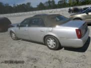 ✅ 2001 Cadillac DeVille • VIN: 1G6KD54Y61U241472 • Lot: 69449404. Listed on Copart with 104,543 mi. Free auction sales archive from the USA and detailed vehicle history report at DreamBid. Image 2.