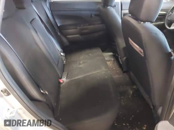 2014 Mitsubishi Outlander ES z VIN 4A4AR3AUXEE009160, wystawiony jako IAAI lot #43436869 z przebiegiem 63 766 mil mil oraz . Historia ofert i sprzedaży dostępna na DreamBid. Obrazek 8.