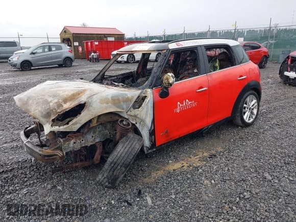 ✅ 2012 MINI Countryman S • VIN: WMWZC5C54CWL63113 • Lot: 42091657. Listed on IAAI with 192,450 mi. Free auction sales archive from the USA and detailed vehicle history report at DreamBid. Image 2.