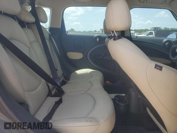 ✅ 2014 MINI Countryman S • VIN: WMWZC5C58EWP35183 • Lot: 62022875. Listed on Copart with 85,571 mi. Free auction sales archive from the USA and detailed vehicle history report at DreamBid. Image 10.