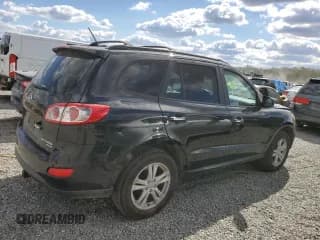 ✅ 2011 Hyundai Santa Fe Limited • VIN: 5XYZK4AG7BG086358 • Lot: 76067674. Listed on Copart with 181,262 mi. Free auction sales archive from the USA and detailed vehicle history report at DreamBid. Image 3.