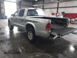 ✅ 2004 Dodge Dakota SLT • VIN: 1D7HG48N64S523528 • Lot: 41199575. Wystawiony na IAAI z przebiegiem 261 239 mil. Bezpłatny archiwum sprzedaży aukcyjnych z USA i szczegółowy raport historii pojazdu na DreamBid. Zdjęcie 3.