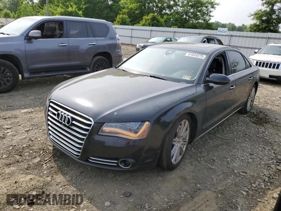 ✅ 2014 Audi A8 3.0L TDI • VIN: WAURMAFD8EN000797 • Lot: 61024275. Listed on Copart with 188,223 mi. Free auction sales archive from the USA and detailed vehicle history report at DreamBid. Image 1.