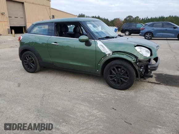✅ 2015 MINI Paceman • VIN: WMWSS1C56FWN95231 • Lot: 84958124. Listed on Copart with 65,099 mi. Free auction sales archive from the USA and detailed vehicle history report at DreamBid. Image 4.