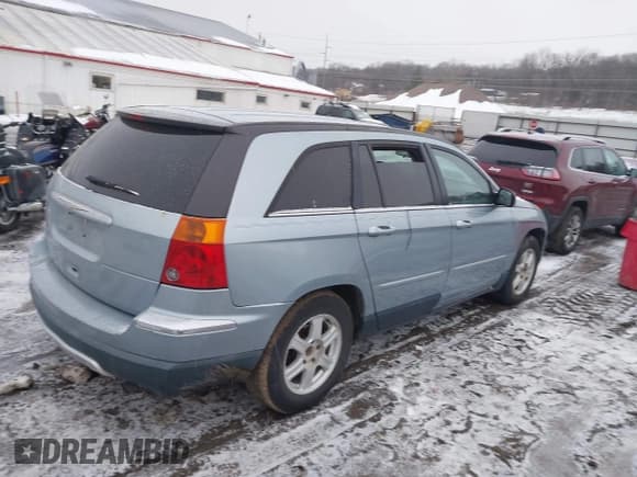 ✅ 2005 Chrysler Pacifica Touring • VIN: 2C4GM684X5R509054 • Lot: 43911461. Listed on IAAI with 186,436 mi. Free auction sales archive from the USA and detailed vehicle history report at DreamBid. Image 4.