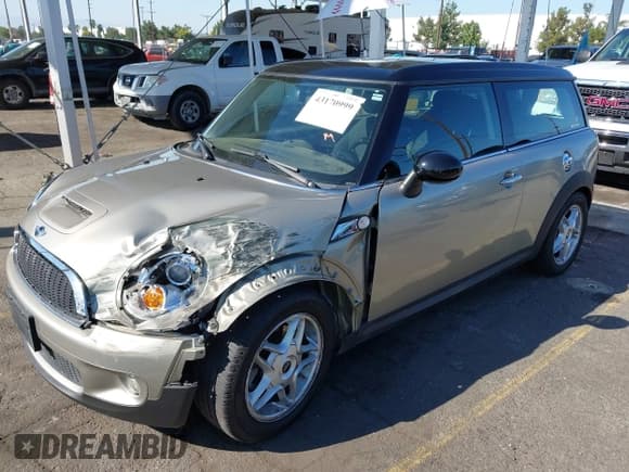 ✅ 2010 MINI Clubman S • VIN: WMWMM3C53ATP93774 • Lot: 43170999. Listed on IAAI with 52,079 mi. Free auction sales archive from the USA and detailed vehicle history report at DreamBid. Image 2.