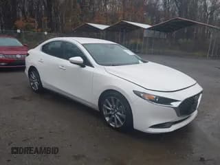 ✅ 2021 Mazda 3 Select • VIN: JM1BPABL4M1319578 • Lot: 43771777. Listed on IAAI with 83,317 mi. Free auction sales archive from the USA and detailed vehicle history report at DreamBid. Image 1.