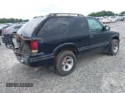 ✅ 1999 GMC Jimmy SLS Comfort/Convenience • VIN: 1GKCT18W9XK514581 • Lot: 42699027. Wystawiony na IAAI z przebiegiem 135 017 mil. Bezpłatny archiwum sprzedaży aukcyjnych z USA i szczegółowy raport historii pojazdu na DreamBid. Zdjęcie 4.