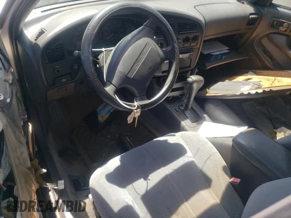 ✅ 1995 Toyota Camry LE • VIN: 4T1GK12E6SU083190 • Lot: 70914815. Wystawiony na Copart z przebiegiem 270 869 mil. Bezpłatny archiwum sprzedaży aukcyjnych z USA i szczegółowy raport historii pojazdu na DreamBid. Zdjęcie 8.