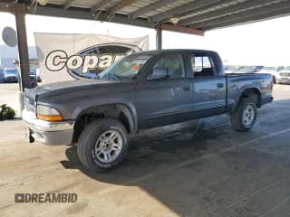 ✅ 2004 Dodge Dakota SLT • VIN: 1D7HG48N04S601186 • Lot: 68977115. Wystawiony na Copart z przebiegiem Nie podano. Bezpłatny archiwum sprzedaży aukcyjnych z USA i szczegółowy raport historii pojazdu na DreamBid. Zdjęcie 1.
