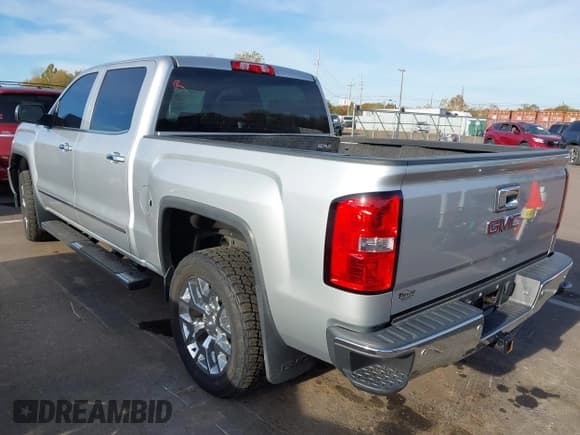 ✅ 2014 GMC Sierra 1500 SLT • VIN: 3GTU2VEC7EG312427 • Lot: 43663488. Listed on IAAI with 101,373 mi. Free auction sales archive from the USA and detailed vehicle history report at DreamBid. Image 3.