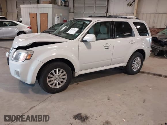 ✅ 2010 Mercury Mariner Premier • VIN: 4M2CN8HGXAKJ00279 • Lot: 41748487. Listed on IAAI with 116,565 mi. Free auction sales archive from the USA and detailed vehicle history report at DreamBid. Image 2.