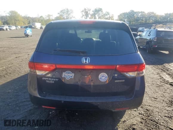 ✅ 2014 Honda Odyssey Touring • VIN: 5FNRL5H95EB025631 • Lot: 87088345. Listed on Copart with 144,539 mi. Free auction sales archive from the USA and detailed vehicle history report at DreamBid. Image 6.