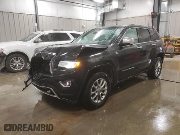 ✅ 2015 Jeep Grand Cherokee Overland • VIN: 1C4RJFCM8FC815544 • Lot: 80519904. Listed on Copart with 132,490 mi. Free auction sales archive from the USA and detailed vehicle history report at DreamBid. Image 1.