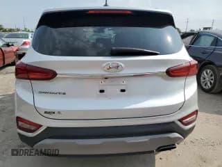 ✅ 2019 Hyundai Santa Fe SE • VIN: 5NMS23ADXKH093781 • Lot: 50336633. Wystawiony na Copart z przebiegiem 49 171 mil. Bezpłatny archiwum sprzedaży aukcyjnych z USA i szczegółowy raport historii pojazdu na DreamBid. Zdjęcie 6.