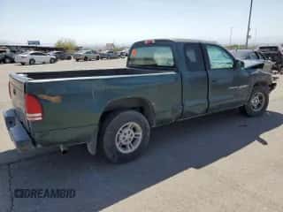 2000 Dodge Dakota with VIN 1B7GL22X8YS720710, listed as a Copart auction lot 71579604 with 302,044 mi miles and Salvage title. Bid and sale history available at DreamBid. Image 3.