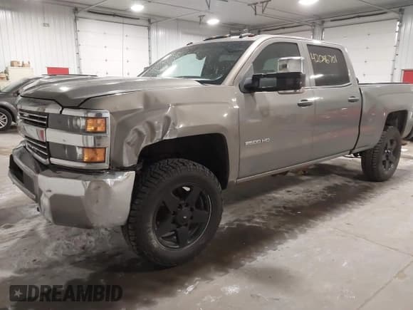✅ 2017 Chevrolet Silverado 2500HD Work Truck • VIN: 1GC1KUEG0HF128856 • Lot: 42046701. Listed on IAAI with 200,705 mi. Free auction sales archive from the USA and detailed vehicle history report at DreamBid. Image 2.
