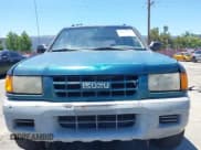 ✅ 1998 Isuzu Rodeo S • VIN: 4S2CK58W9W4313907 • Lot: 42843094. Listed on IAAI with 252,428 mi. Free auction sales archive from the USA and detailed vehicle history report at DreamBid. Image 6.