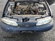 ✅ 2000 Oldsmobile Alero GLS • VIN: 1G3NF12E3YC416007 • Лот: 76420864. Опубликован ранее на Copart с пробегом 161 678 миль. Бесплатный доступ к архиву аукционных продаж из США и подробный отчёт об истории автомобиля на DreamBid. Изображение 11.