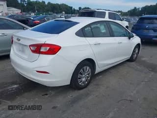 ✅ 2018 Chevrolet Cruze LS • VIN: 1G1BC5SM3J7154006 • Lot: 43304387. Listed on IAAI with 118,821 mi. Free auction sales archive from the USA and detailed vehicle history report at DreamBid. Image 4.