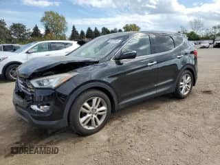 2013 Hyundai Santa Fe Sport z VIN 5XYZW3LA9DG072987, wystawiony jako Copart lot #85272635 z przebiegiem 104 312 mil mil oraz Szkoda całkowita • Salvage title. Historia ofert i sprzedaży dostępna na DreamBid. Obrazek 1.