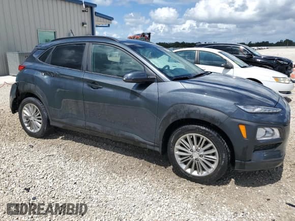 ✅ 2019 Hyundai Kona SEL • VIN: KM8K22AA0KU210742 • Лот: 61947174. Опубликован ранее на Copart с пробегом 54 772 миль. Бесплатный доступ к архиву аукционных продаж из США и подробный отчёт об истории автомобиля на DreamBid. Изображение 4.