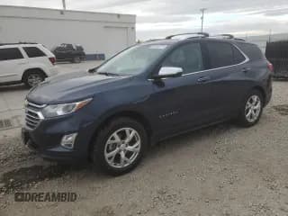 ✅ 2018 Chevrolet Equinox Premier • VIN: 3GNAXVEV1JL131869 • Лот: 92955715. Опубликован ранее на Copart с пробегом 95 858 миль. Бесплатный доступ к архиву аукционных продаж из США и подробный отчёт об истории автомобиля на DreamBid. Изображение 1.