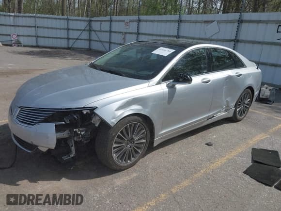 ✅ 2014 Lincoln MKZ • VIN: 3LN6L2JK2ER835999 • Lot: 42146784. Listed on IAAI with 112,457 mi. Free auction sales archive from the USA and detailed vehicle history report at DreamBid. Image 2.