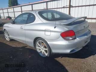 2001 Hyundai Tiburon с VIN KMHJG25F21U252699, выставлен на аукционе IAAI как лот 43022128 с пробегом 72 837 миль миль и . История ставок и продаж доступна на DreamBid. Изображение 3.