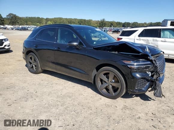 ✅ 2023 Genesis GV70 2.5T • VIN: KMUMADTB1PU125513 • Lot: 87042335. Listed on Copart with 35,746 mi. Free auction sales archive from the USA and detailed vehicle history report at DreamBid. Image 4.