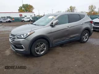 ✅ 2017 Hyundai Santa Fe 2.4L • VIN: 5NMZTDLB3HH003960 • Лот: 43535086. Опубликован ранее на IAAI с пробегом 164 538 миль. Бесплатный доступ к архиву аукционных продаж из США и подробный отчёт об истории автомобиля на DreamBid. Изображение 2.