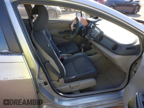 ✅ 2010 Honda Insight LX • VIN: JHMZE2H52AS021621 • Lot: 41375852. Listed on IAAI with 214,635 mi. Free auction sales archive from the USA and detailed vehicle history report at DreamBid. Image 5.