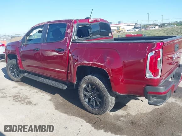 ✅ 2021 GMC Canyon 4WD AT4 • VIN: 1GTG6FEN1M1295470 • Lot: 43071098. Listed on IAAI with 84,517 mi. Free auction sales archive from the USA and detailed vehicle history report at DreamBid. Image 3.