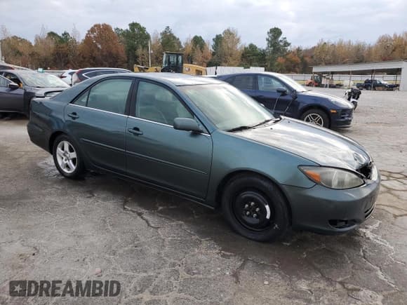 ✅ 2002 Toyota Camry XLE • VIN: 4T1BF30K52U539571 • Lot: 93326725. Listed on Copart with 233,708 mi. Free auction sales archive from the USA and detailed vehicle history report at DreamBid. Image 4.
