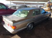 ✅ 1990 Mercedes-Benz 560 • VIN: WDBCA39E7LA505668 • Лот: 41473380. Опубликован ранее на IAAI с пробегом 159 716 миль. Бесплатный доступ к архиву аукционных продаж из США и подробный отчёт об истории автомобиля на DreamBid. Изображение 4.