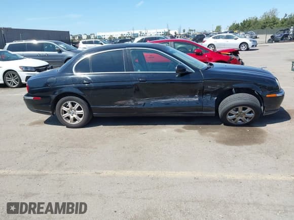 ✅ 2003 Jaguar S-Type • VIN: SAJEA01T13FM70486 • Лот: 41989501. Опубликован ранее на IAAI с пробегом 100 109 миль. Бесплатный доступ к архиву аукционных продаж из США и подробный отчёт об истории автомобиля на DreamBid. Изображение 13.