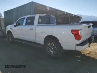 ✅ 2016 Nissan Titan Platinum Reserve • VIN: 1N6BA1F29GN516548 • Lot: 84054855. Wystawiony na Copart z przebiegiem 194 897 mil. Bezpłatny archiwum sprzedaży aukcyjnych z USA i szczegółowy raport historii pojazdu na DreamBid. Zdjęcie 2.