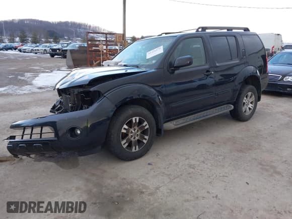 ✅ 2010 Nissan Pathfinder SE • VIN: 5N1AR1NB7AC629700 • Lot: 41426876. Listed on IAAI with 298,925 mi. Free auction sales archive from the USA and detailed vehicle history report at DreamBid. Image 2.