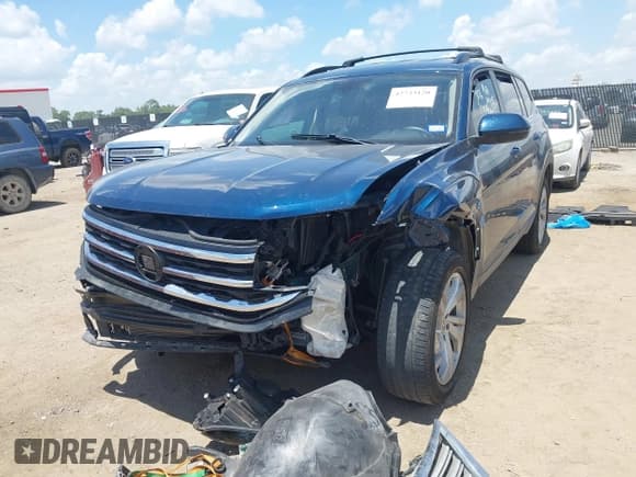✅ 2022 Volkswagen Atlas SE • VIN: 1V2WR2CA4NC510131 • Lot: 42733120. Listed on IAAI with 63,225 mi. Free auction sales archive from the USA and detailed vehicle history report at DreamBid. Image 2.